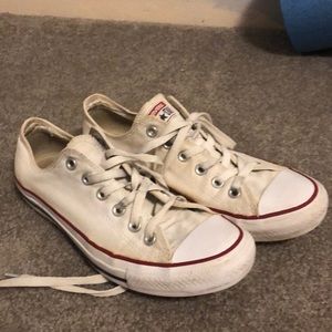 Used white low top converse.